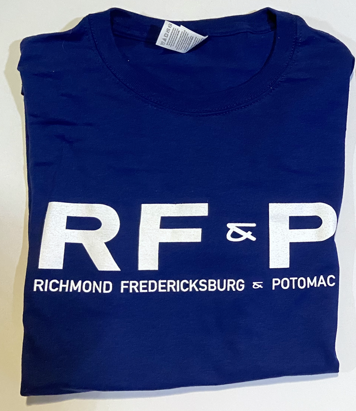 Photo of blue t-shirt front with white lettering of the initials RF&P with the words underneath Richmond Fredericksburg and Potomac in the style that appeared on locomotives and freight cars from the 1960's onward.